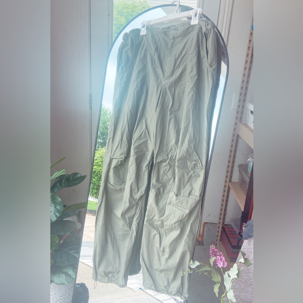 Green cargo parachute pants